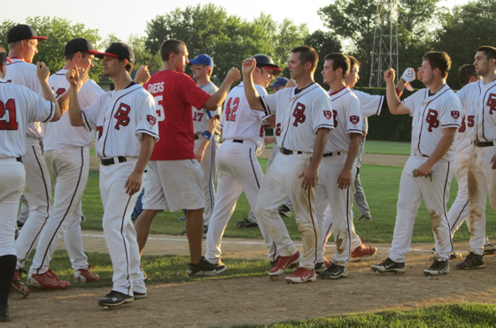 The Tigers celebrate an 11-1 win over Arlington on Sunday night July 22